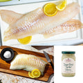 Haddock & Cod Whitefish Box — raw haddock on a platter, cod on a cutting board, and Down East Tartar Sauce