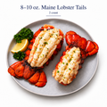 Two prepared Maine lobster tails on a gray plate, labeled 8–10 oz. Maine Lobster Tails, 2 count.