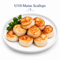 Seared Maine scallops on a white plate, labeled U/10 Maine Scallops, 1 lb.