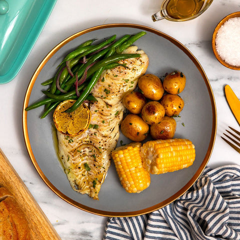 Cooked Icelandic haddock fillet with vegetables