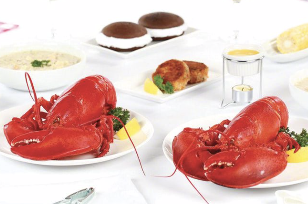 Cooked lobster on white plates